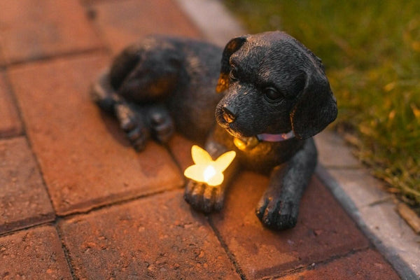 Weatherproof puppy garden statue with solar lantern light
