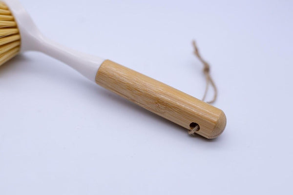 Sustainable kitchen cleaning brush with natural bamboo handle