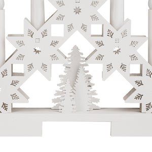 White decorative panel with cut-out star shapes and a tree silhouette on a white background