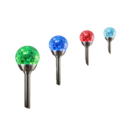 Four solar-powered garden path lights with crackle glass spheres in green, blue, red, and light blue, mounted on metal stakes along a stone pathway in a landscaped garden at night.