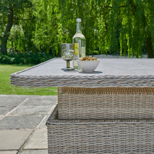 Adjustable height garden dining table