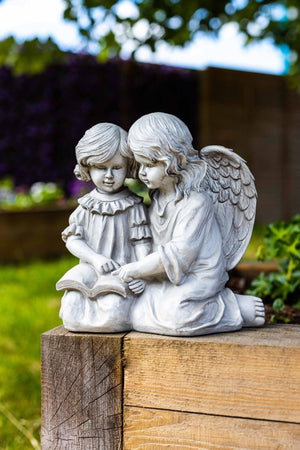Resin reading angel lamp statue