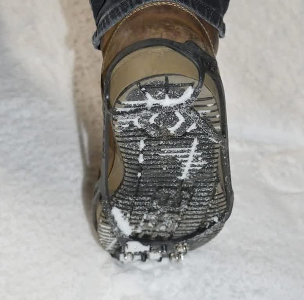 Steel spike traction aids for icy ground