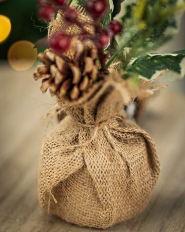 artificial-christmas-tree-with-jute-bags-burlap-sack