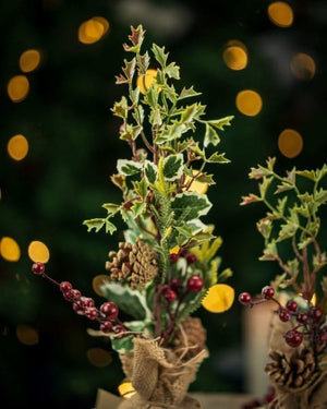 artificial-christmas-tree-with-jute-bags-burlap-sack