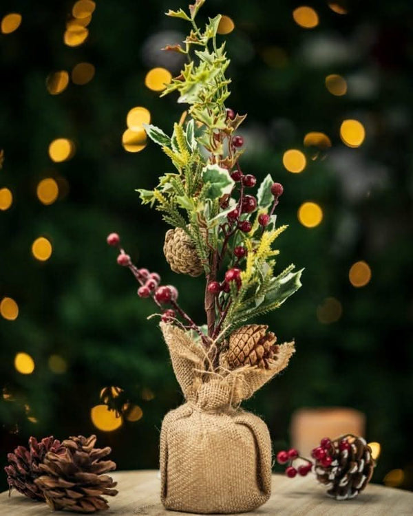 artificial-christmas-tree-with-jute-bags-burlap-sack