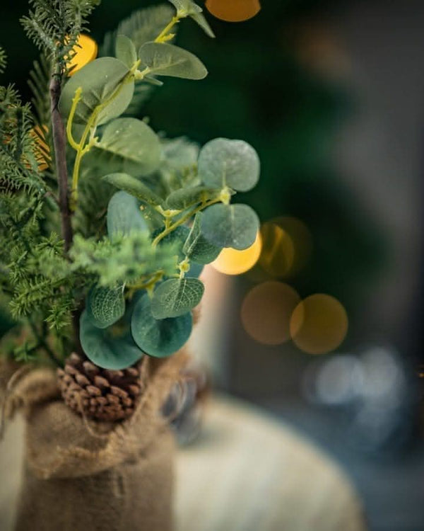 artificial-christmas-tree-with-jute-bags-burlap-sack