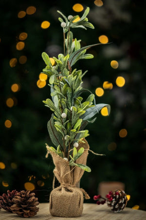 artificial-christmas-tree-with-jute-bags-burlap-sack