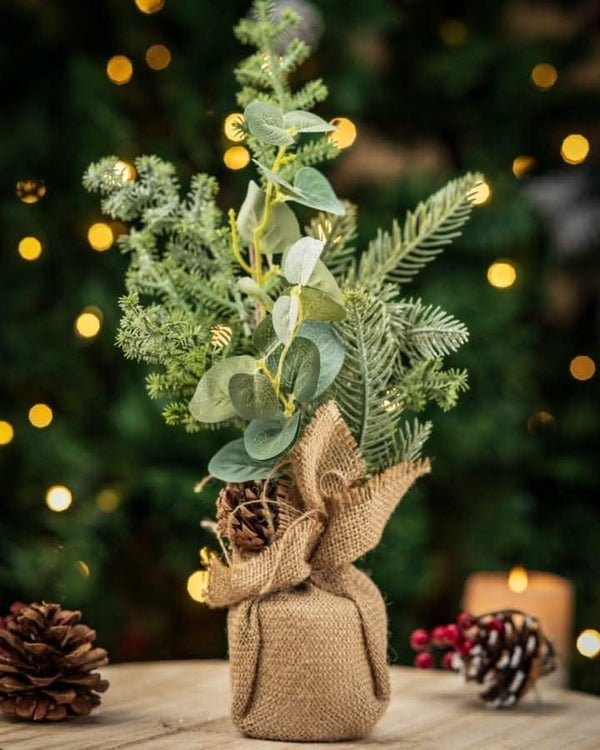 artificial-christmas-tree-with-jute-bags-burlap-sack