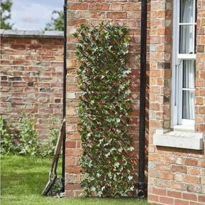 Expandable garden trellis with realistic maple leaves