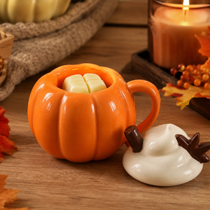 Seasonal oil burner styled with cosy autumn décor