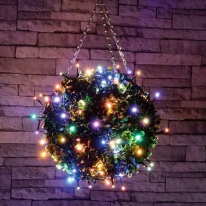 Multicoloured Christmas string lights illuminated indoors