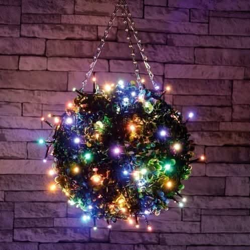 Multicoloured Christmas string lights illuminated indoors