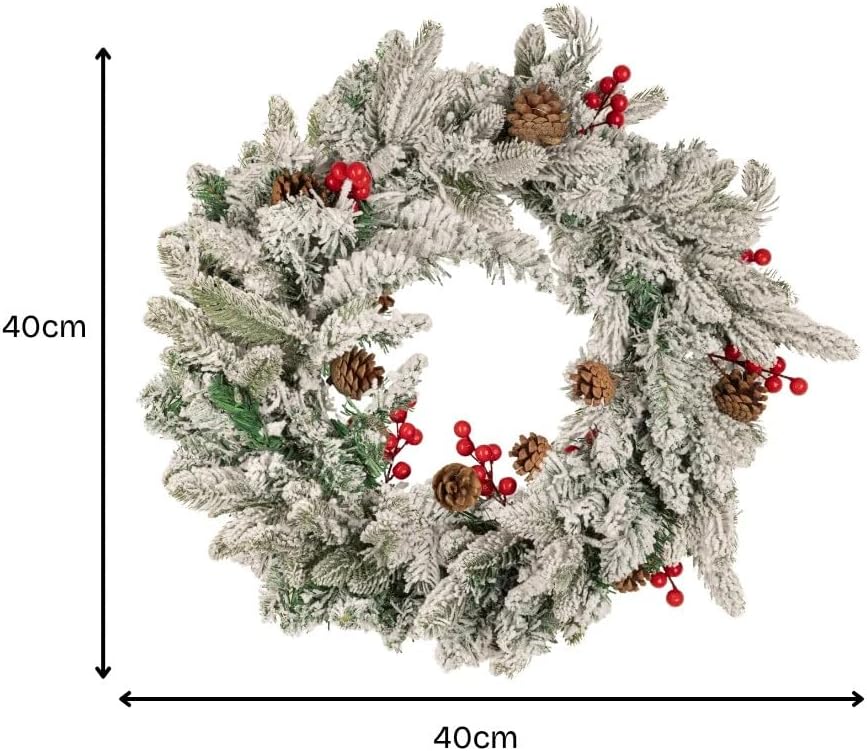 Snow flocked Christmas wreath with LED lights.