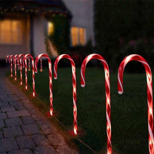 25cm Christmas candy cane stake lights in garden