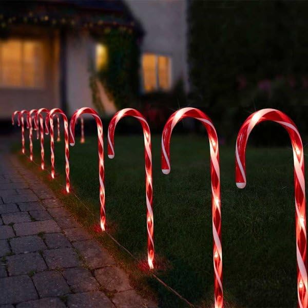25cm Christmas candy cane stake lights in garden