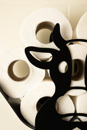 Toilet rolls forming the body of a cow holder