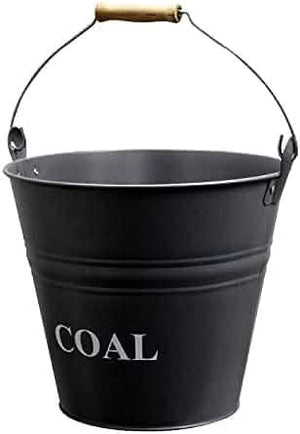 Coal storage bucket positioned beside a fireplace