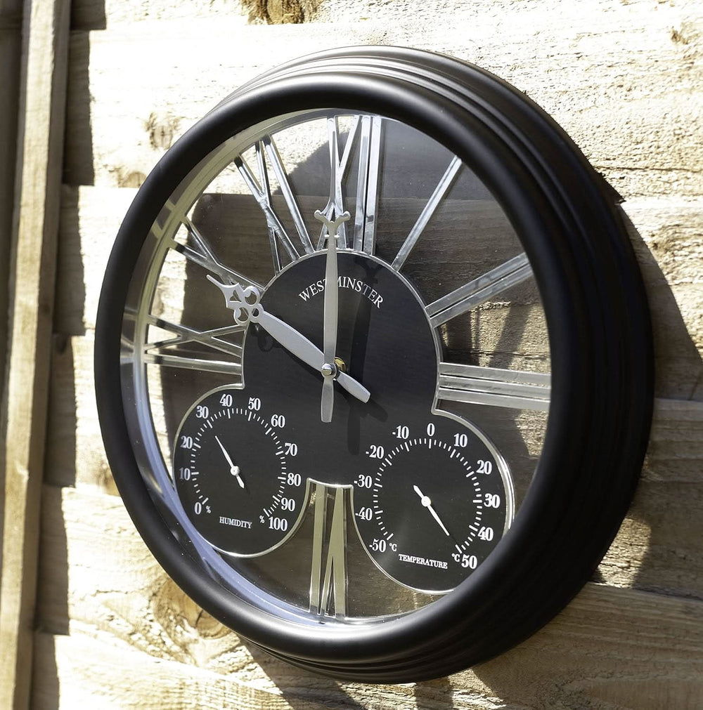 Large black garden clock with thermometer and barometer