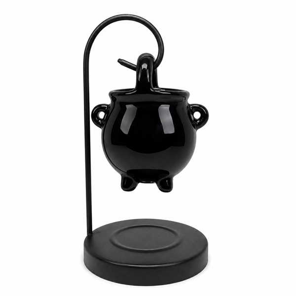Gothic cauldron fragrance burner displayed on a shelf