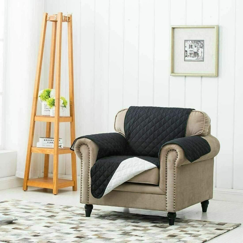 Black quilted armchair cover for one seat chair