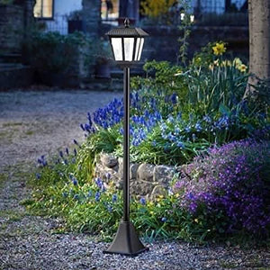Black traditional solar lamp post displayed outdoors