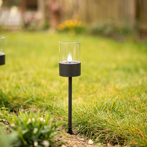 Black garden ground spike light shown close up