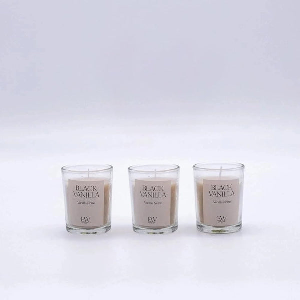 Three Black Vanilla candles displayed together