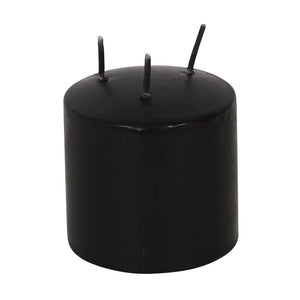 Black cylindrical candle with three wicks on a white background