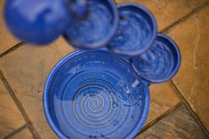 Cascading ceramic water feature with separate solar panel