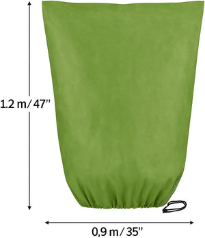 Breathable horticultural fleece cover protecting garden plants.