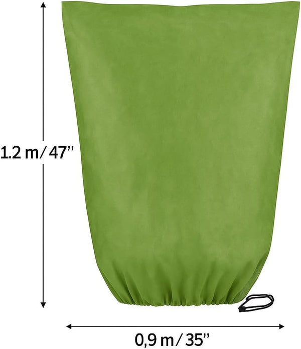 Breathable horticultural fleece cover protecting garden plants.