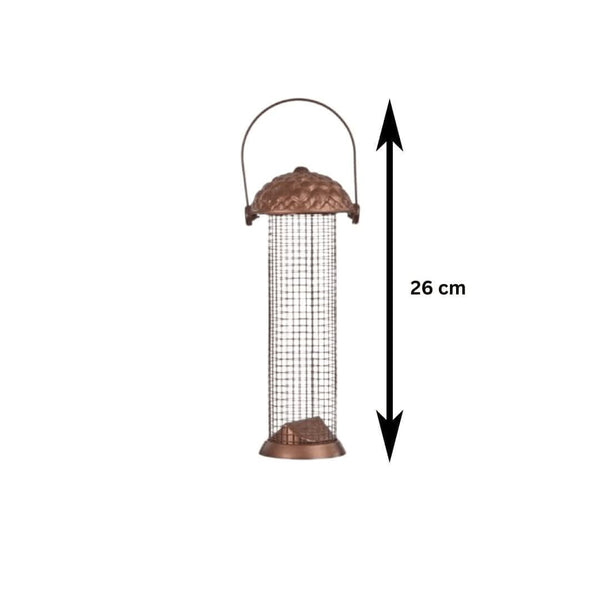 Metal peanut bird feeding station hanging in a garden