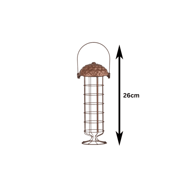 Metal bird feeding station hanging in a garden