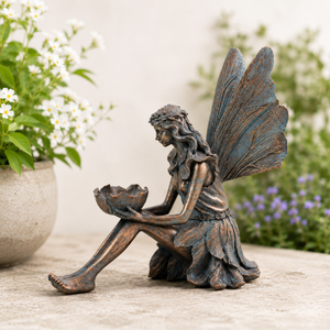 Bronze effect sitting fairy garden ornament