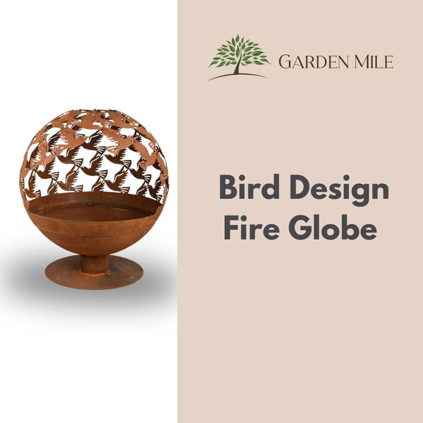 Round outdoor fire globe with bird pattern.