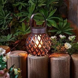 Bronze effect hanging lantern with flickering flame