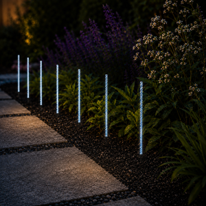 Garden path lined with multicolour LED stake lights