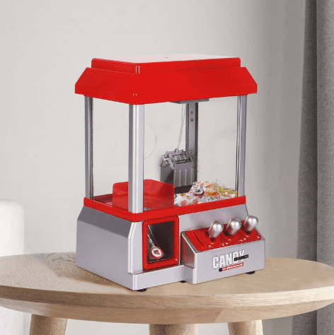 Candy grabber machine with interactive arcade claw mechanism