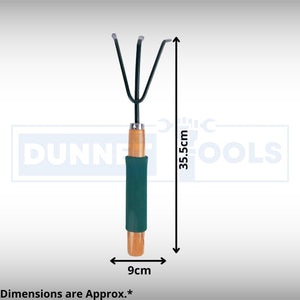 Wooden handle hand rake for loosening garden soil.