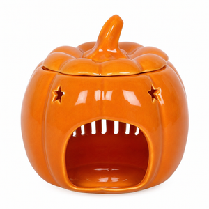 Autumn wax melt burner displayed on a cosy table