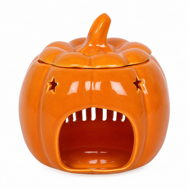 Autumn wax melt burner displayed on a cosy table