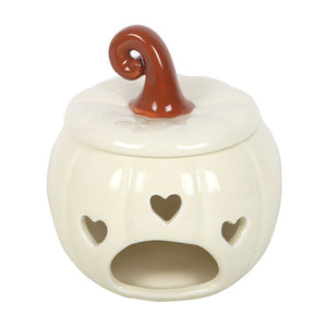 Ceramic pumpkin-shaped oil burner with a brown stem on a white background