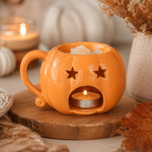 Pumpkin oil burner arranged in a cosy living room