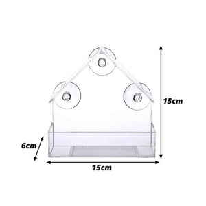 Window mounted bird feeder with feeding tray