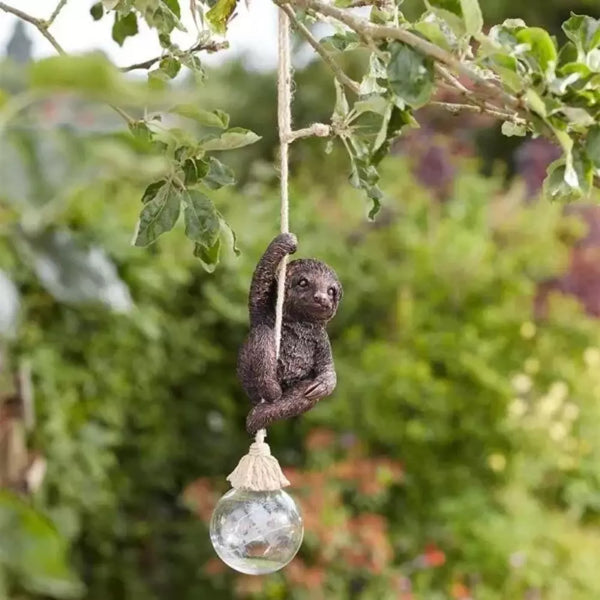 Hanging resin sloth with firefly effect light