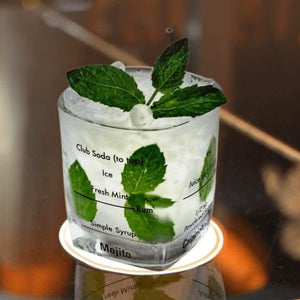Four cocktail mixing glasses shown from front