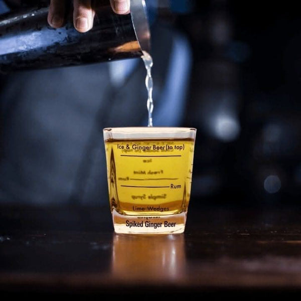 Cocktail glass with ingredient measurements