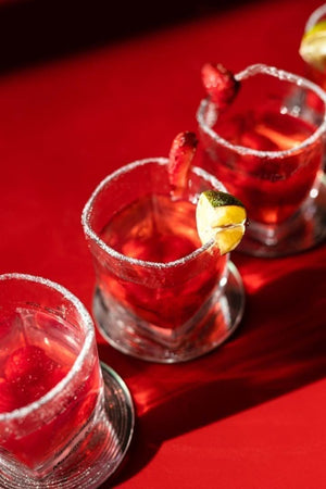 Cocktail recipe glass shown close up