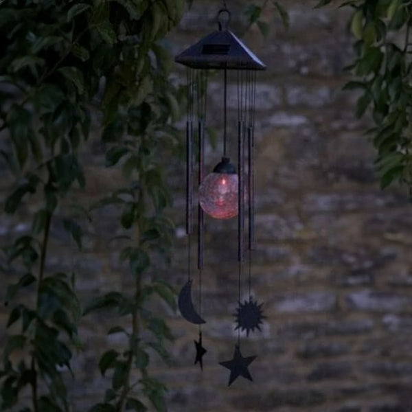 Solar wind chimes featuring sun moon and star shapes
